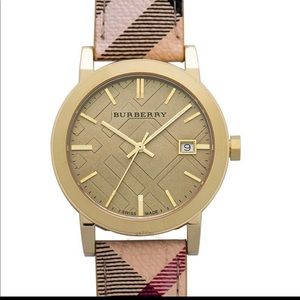 Burberry womens used watch BURBERRY
The City Women Check
Strap Gold Tone 26mm